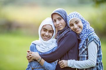 Three young Muslim women