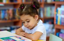 Image of preschool girl reading 