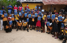 Children in Liberia receive books from Let's Read book distribution