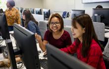 Young women in computer science class